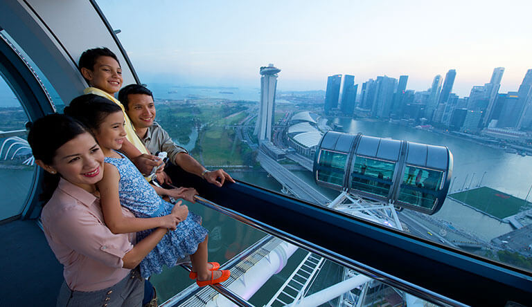 family-enjoying-view-from-singapore-flyer